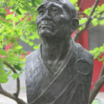 Yi