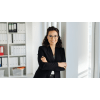 Female business professional with arms crossed
