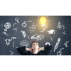 Student with education symbols on a blackboard