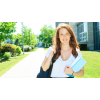 Happy female student on a college campus