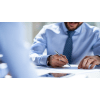 Businessman writing with a pen