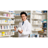 Pharmacist holding a bottle of medicine