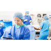 Surgical tech working in an operating room