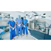 Surgical techs in operation room