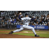 pitcher throwing a baseball from the pitcher's mound