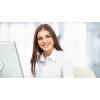 young business professional sitting at a computer