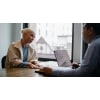 Young woman during an interview with a financial aid advisor