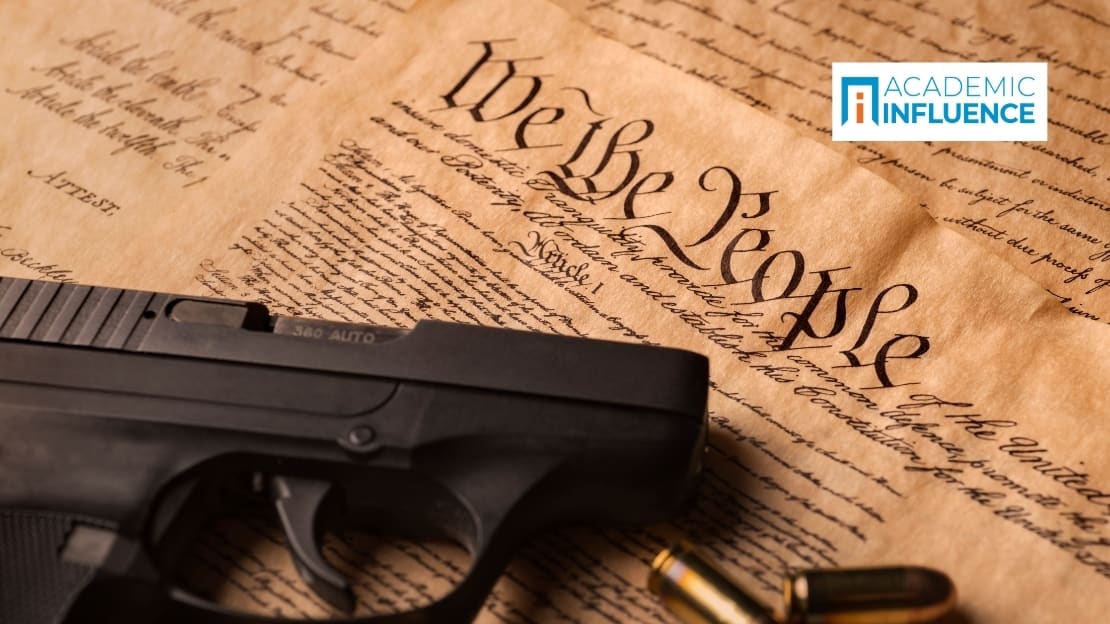 A gun laying on the U.S. constitution