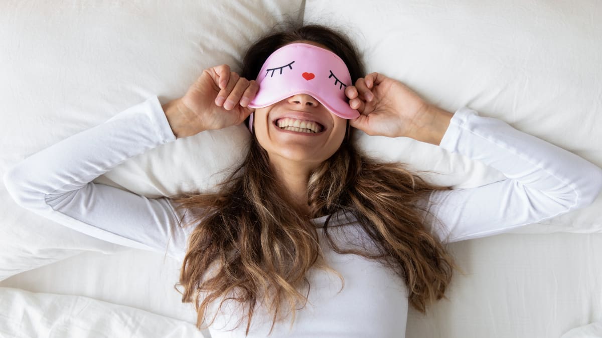 Student wearing a sleep mask