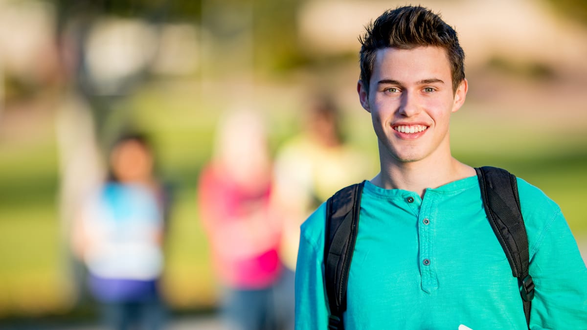Smiling student in blurred background