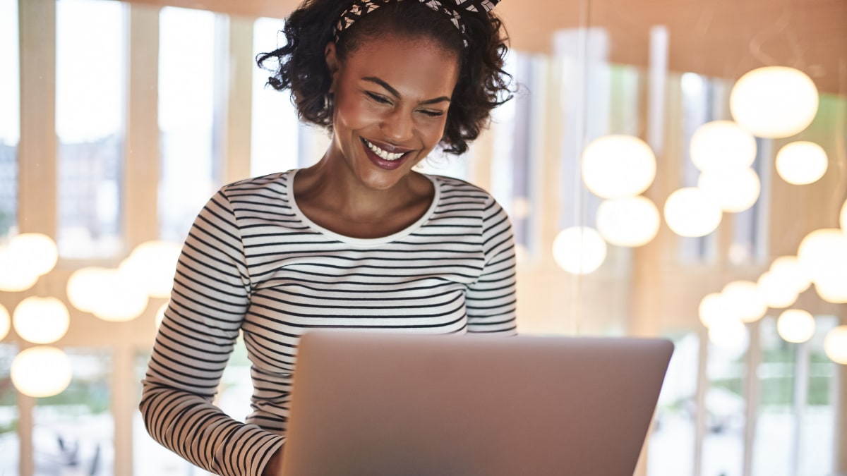 Happy woman on a laptop