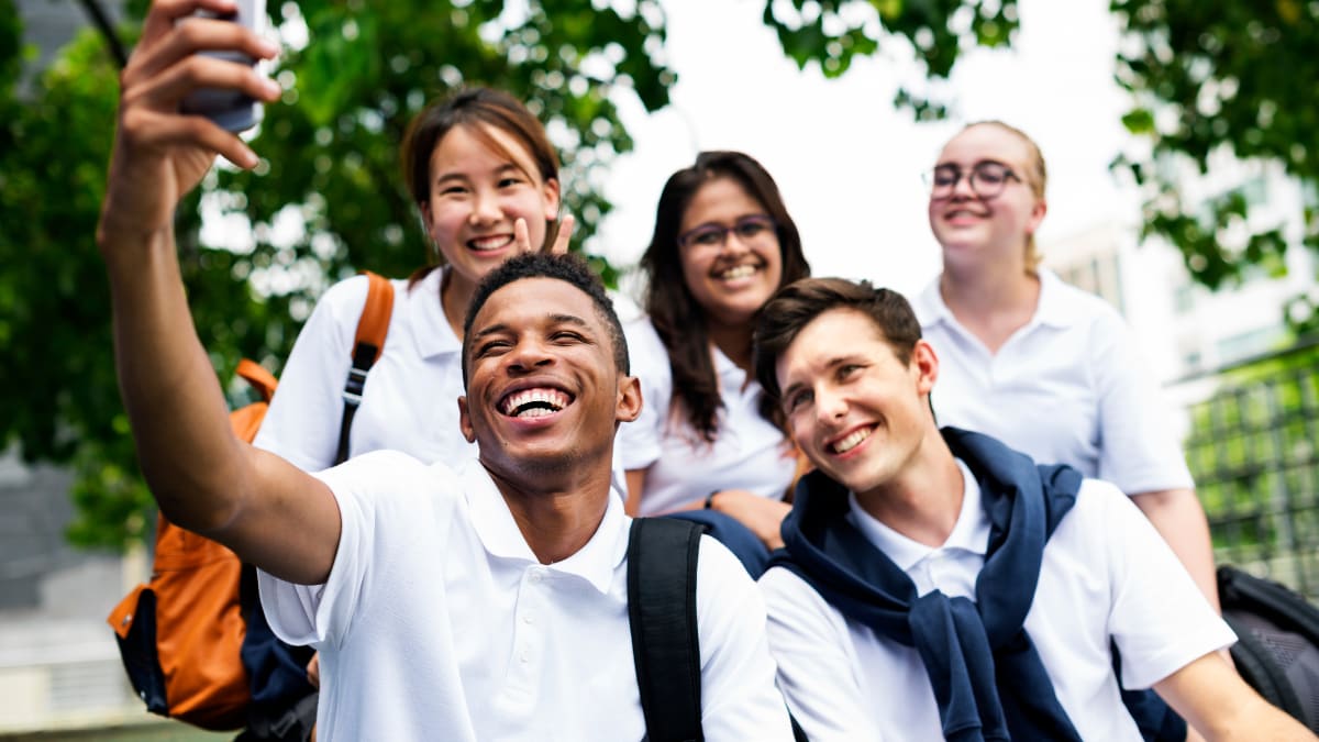 Diverse group of students taking a selfie