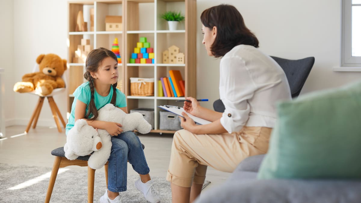 Woman counseling a young girl