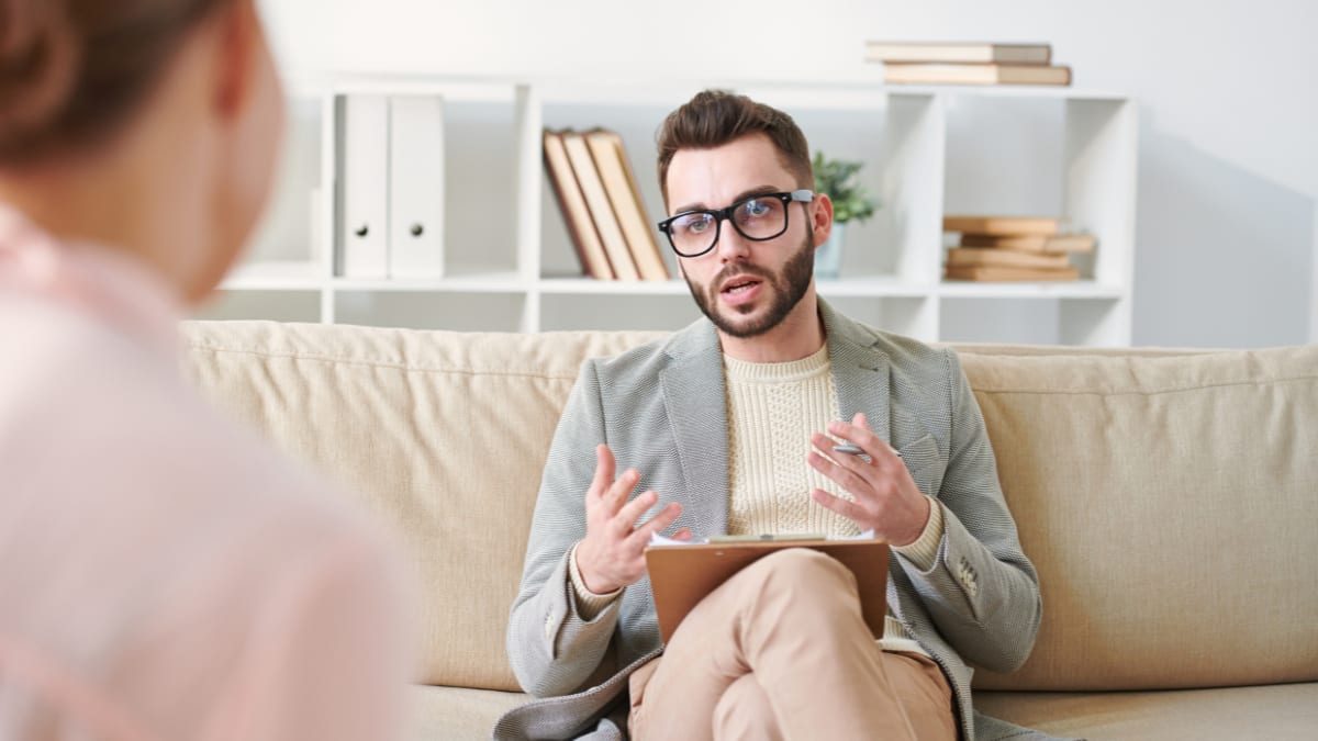 Counselor talking to a patient