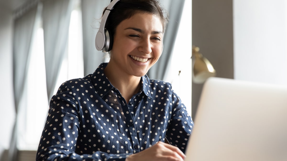 Happy woman doing an online course