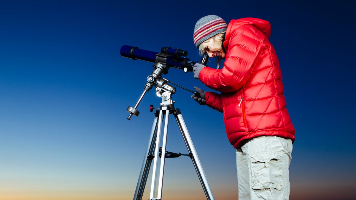 Person using a telescope