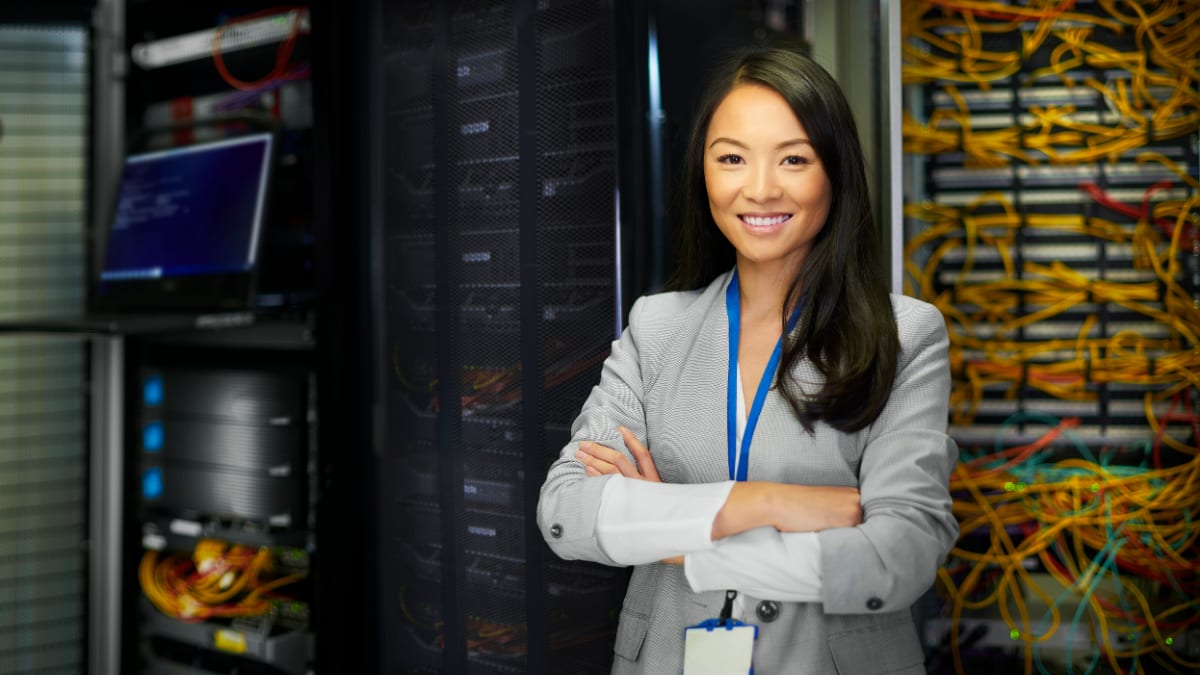 Young woman standing in a server room