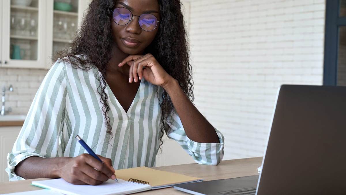 Woman with glasses studying