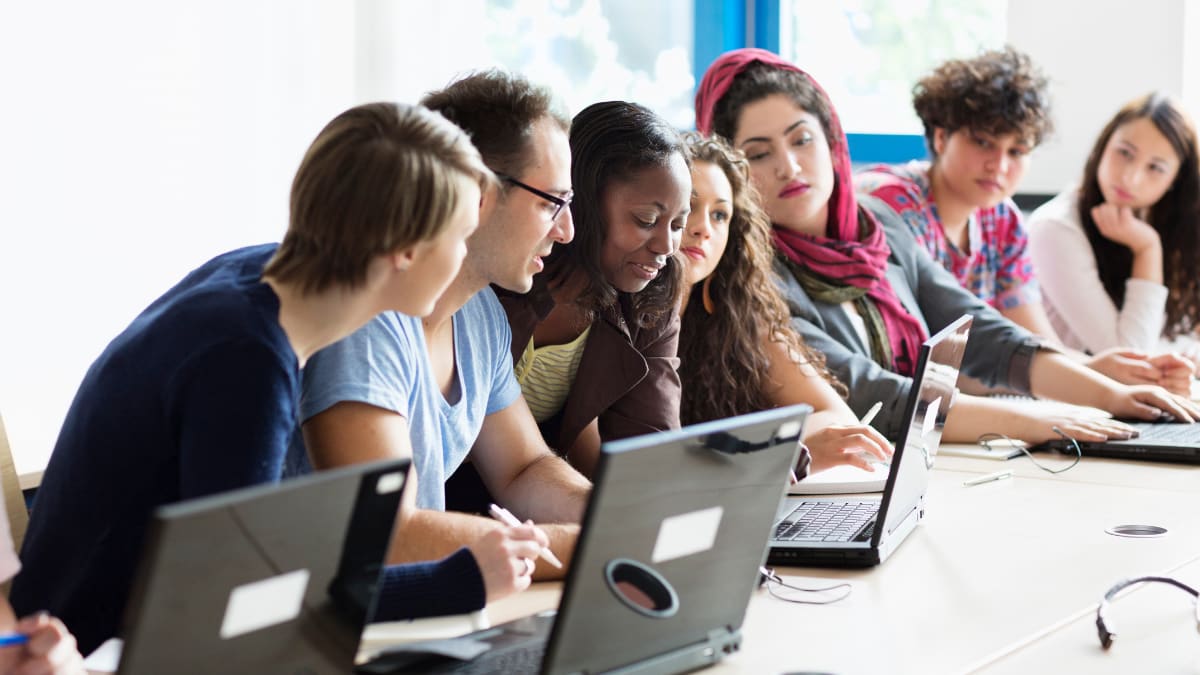 A group of students on laptops