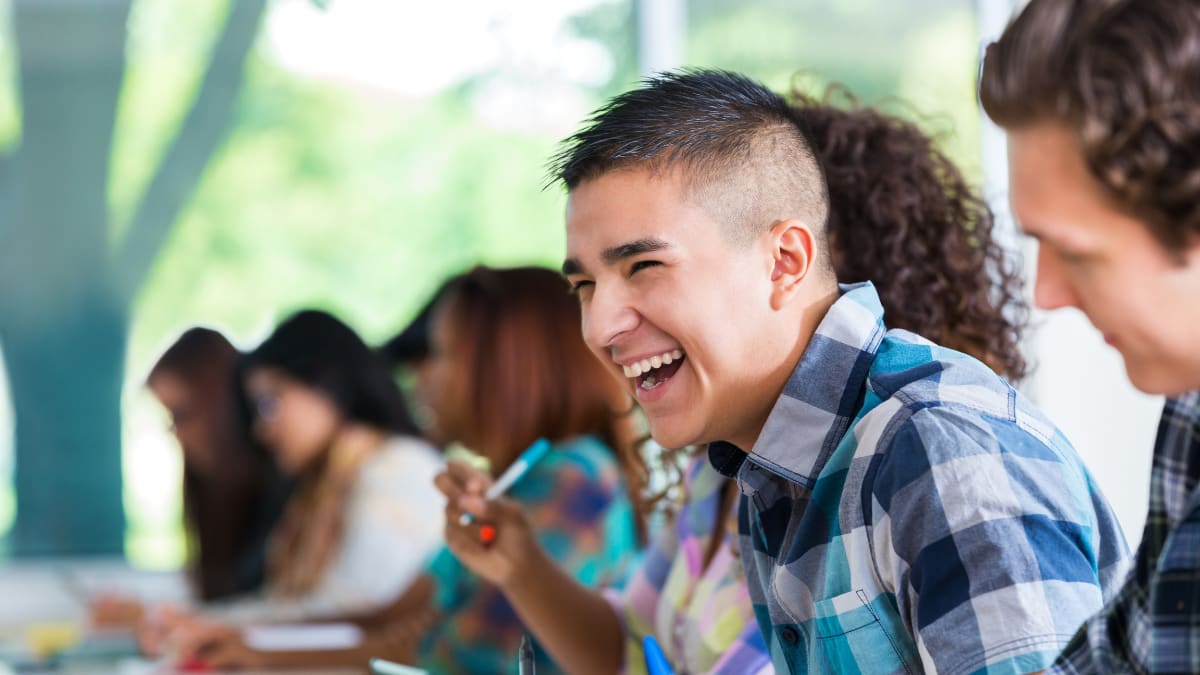 Students laughing in a classroom