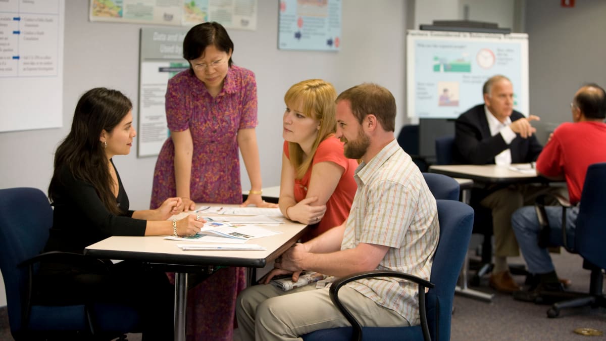 Health professional talking to patients