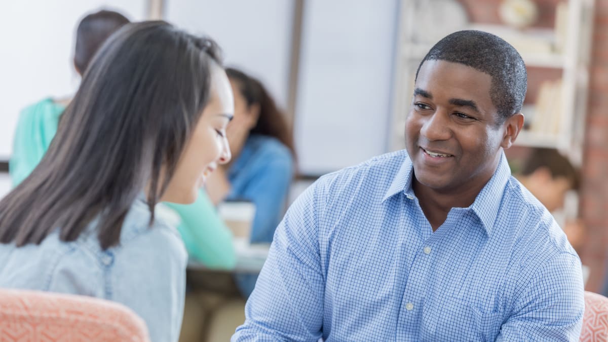 Counselor teaching student