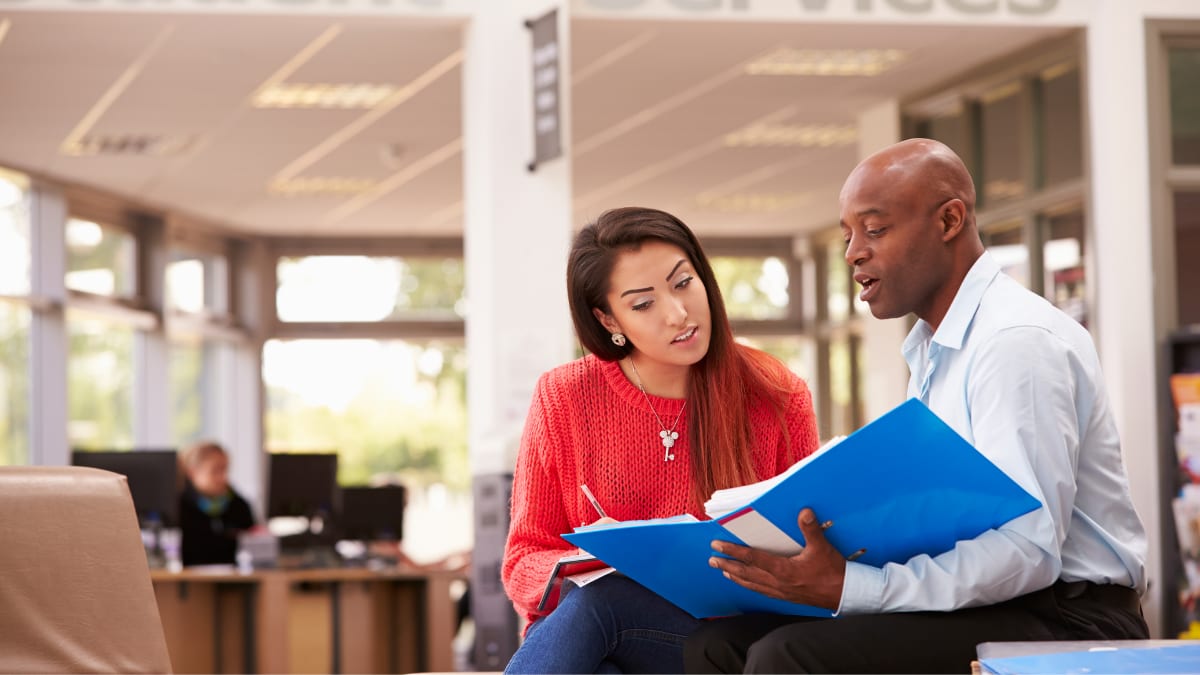 Man and woman working in an office