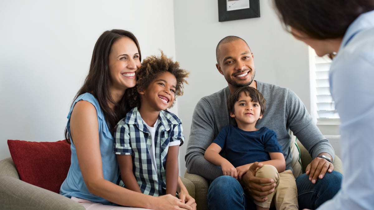 Family speaking to a behavior professional