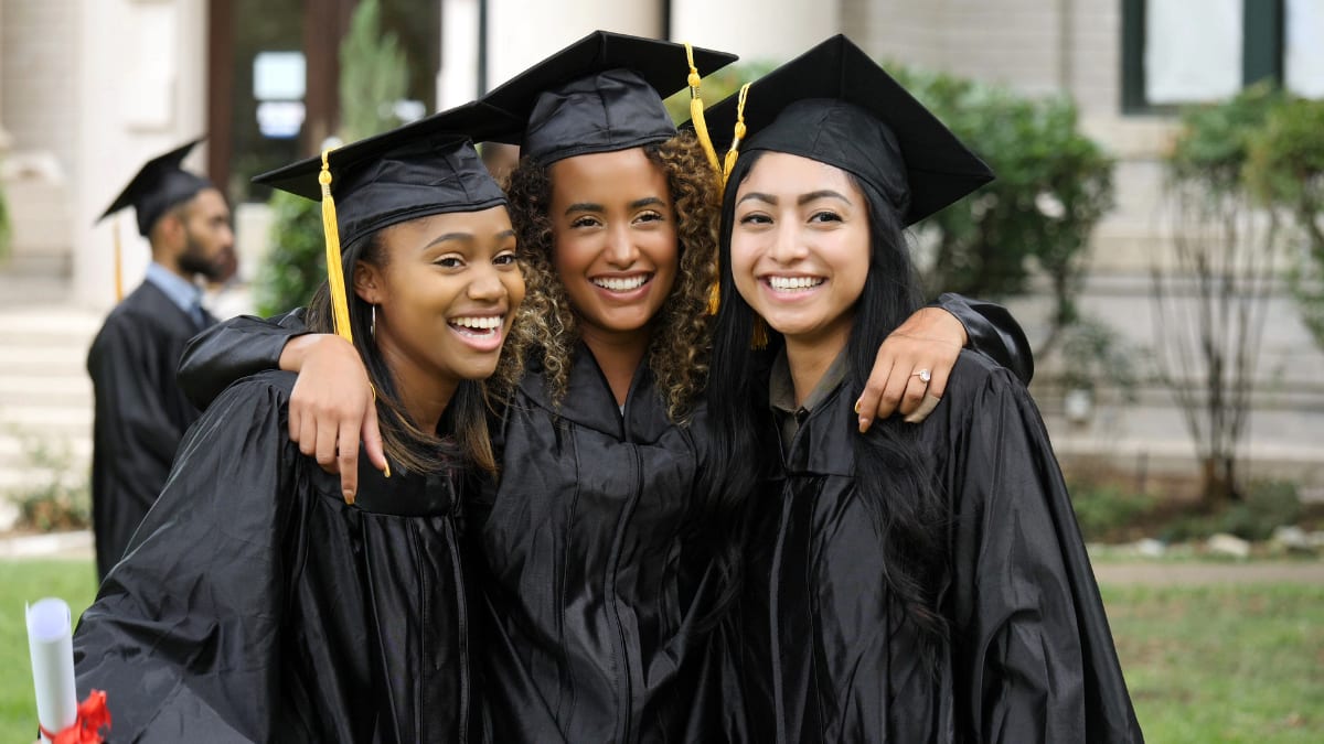 Black graduates with cap and gown