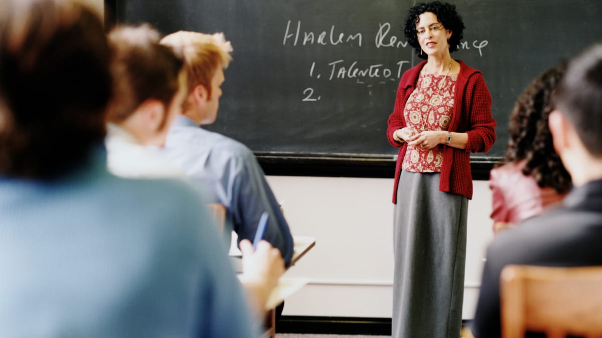 Teacher teaching students in a classroom