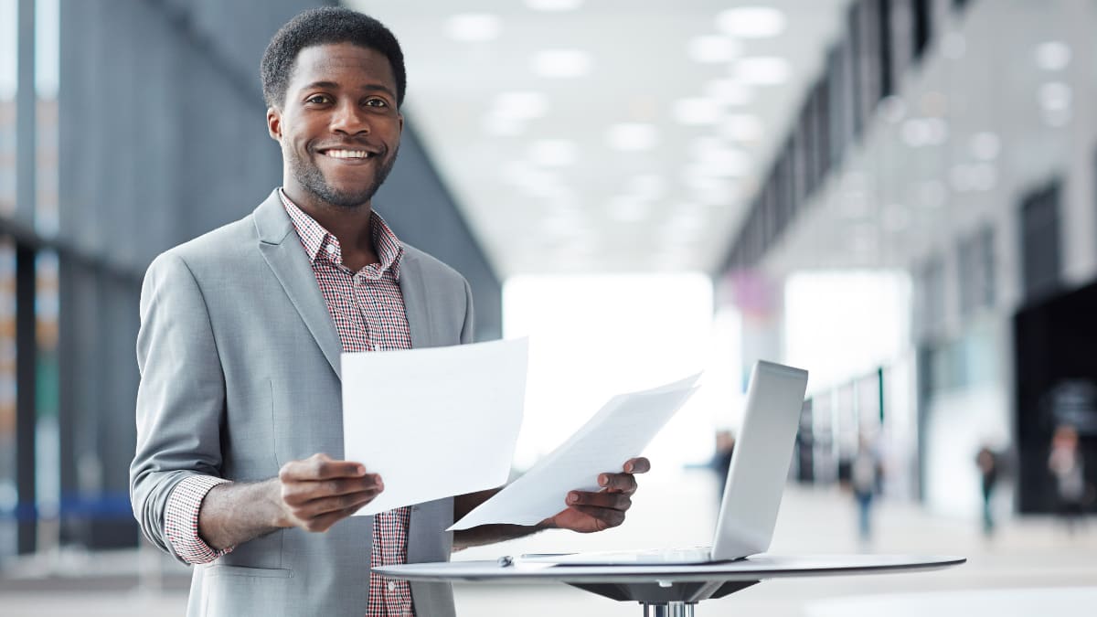 Happy businessman working in an office building