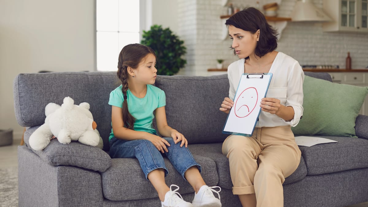 Female psychologist helping a girl