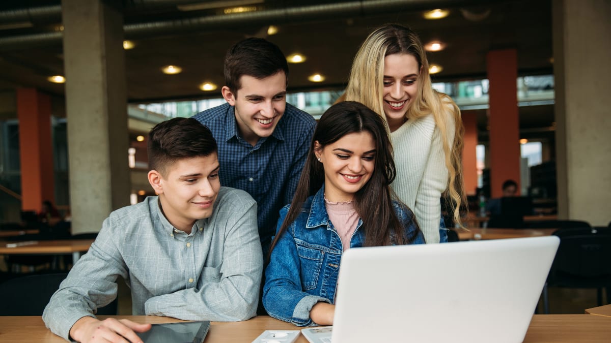 Students working together on a laptop