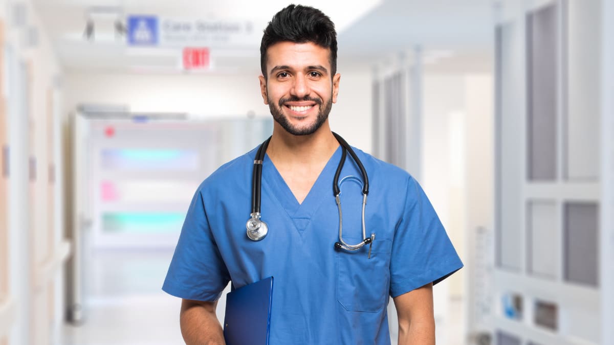 Smiling male nurse with stethoscope