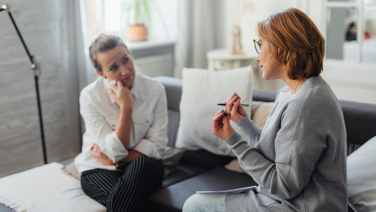 Psychologist speaking to a patient