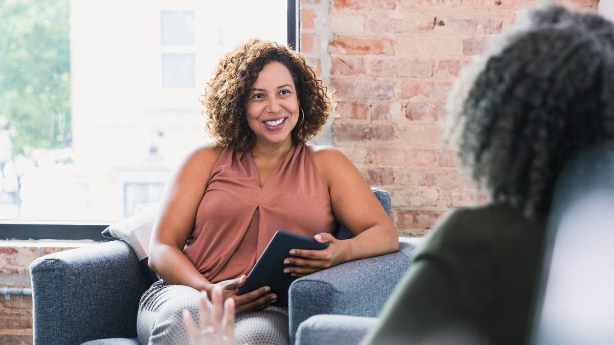 Female psychologist smiling at a patient