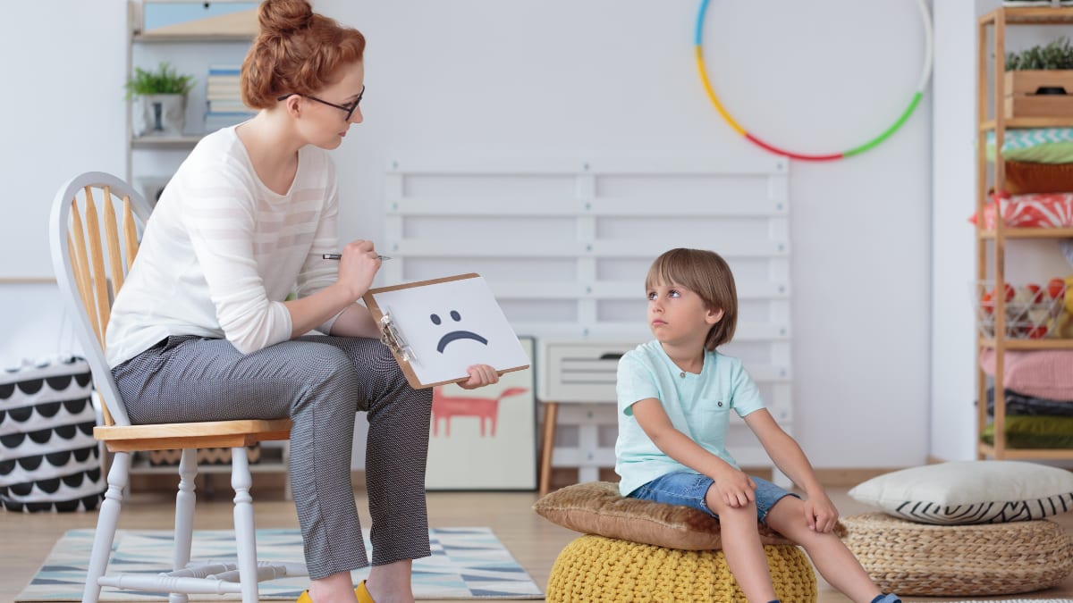 Counselor working with a small child