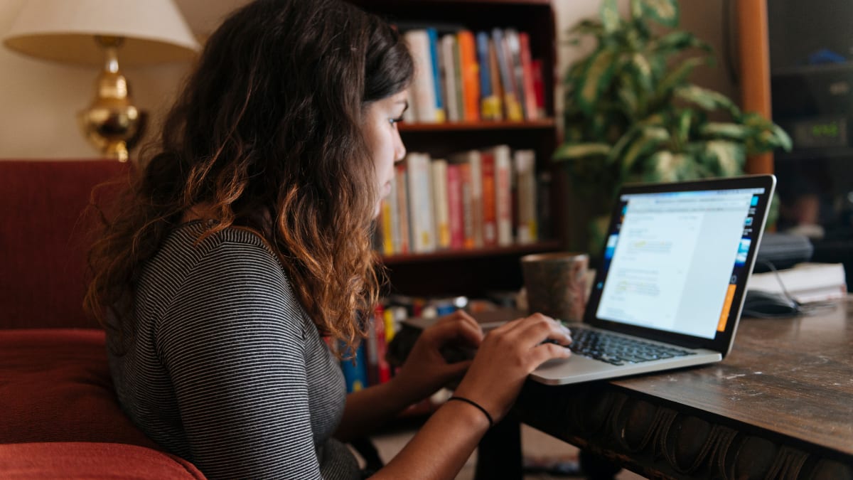 Female student working on laptop