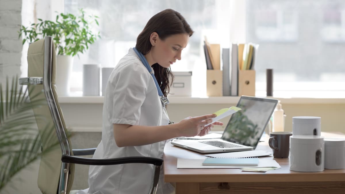 Doctor researching at a desk