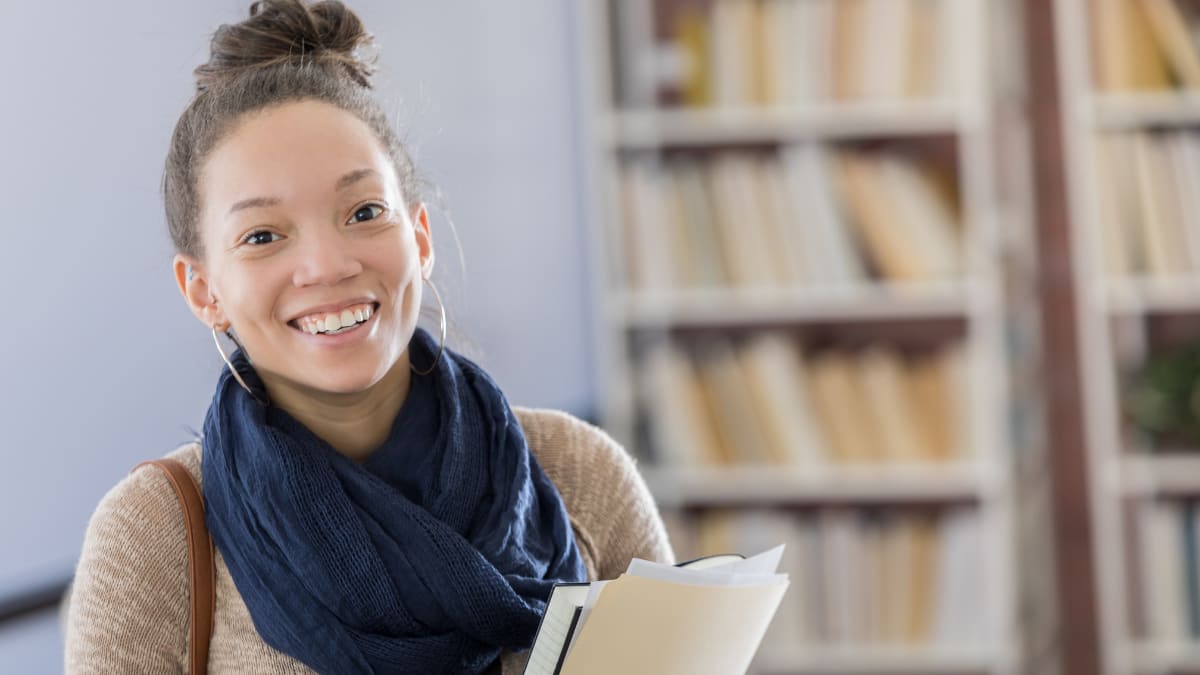 Happy woman in a blue scarf