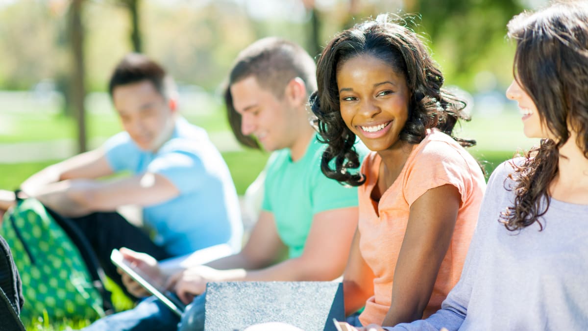 Group of students studying in a park