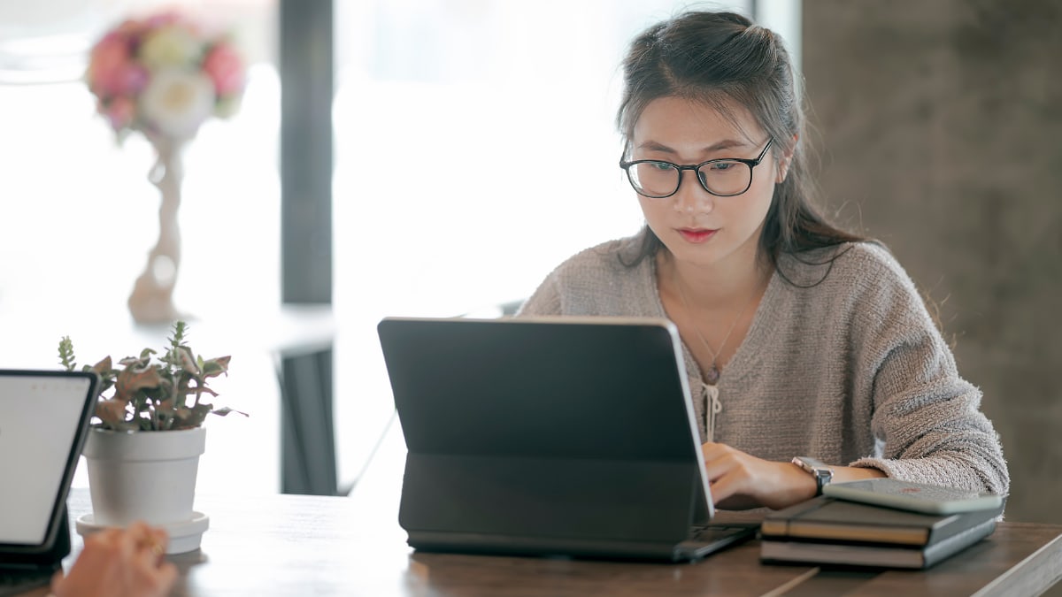 Female studying with an electronic tablet