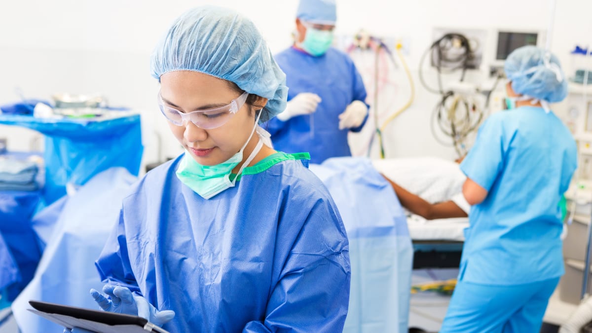 Surgical tech working in an operating room