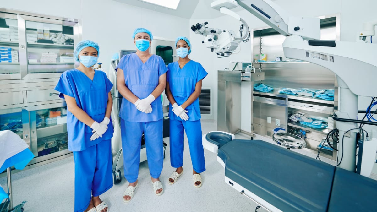 Surgical techs in operation room