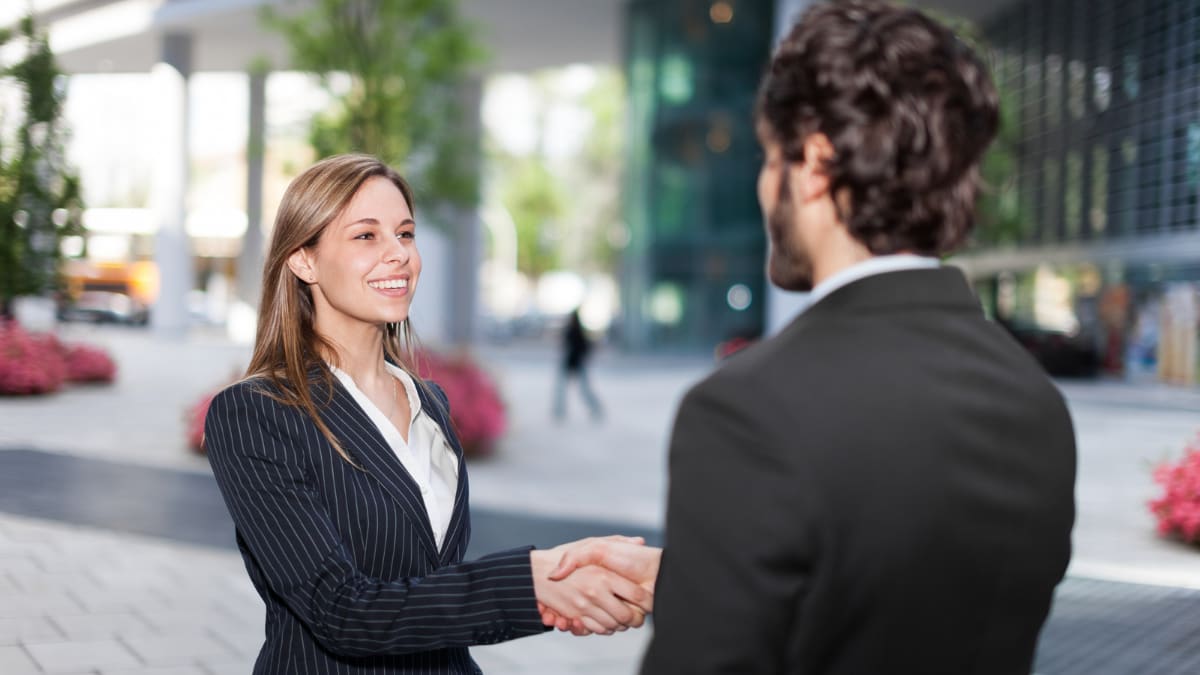 Two businesspeople shaking hands