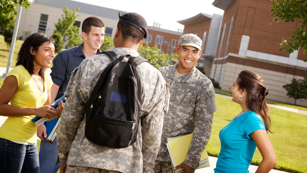 Military students talking to civilian students