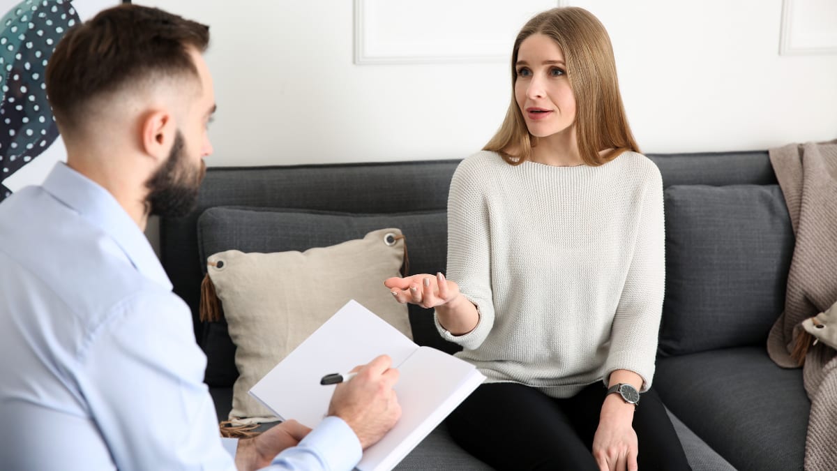 Psychologist listening to a patient