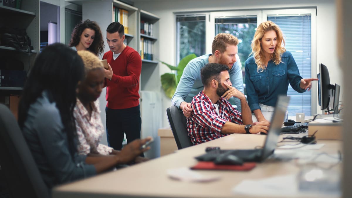 Team of people working on web design