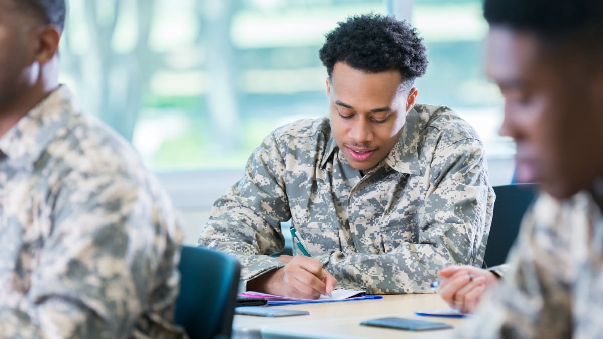 Students in military uniforms in a classroom