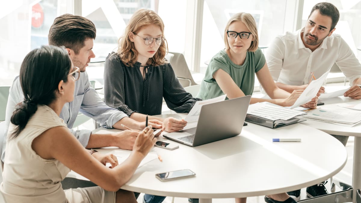 People sitting around a conference table having a business planning meeting